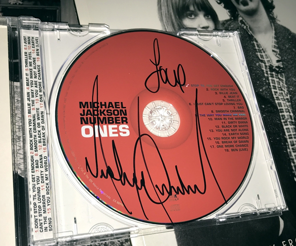 005 NUMBER ONES亲笔签名精选CD2.jpg